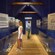 2 people in a museum look at information regarding the history of the Caribbean